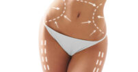Sexy belly over white background