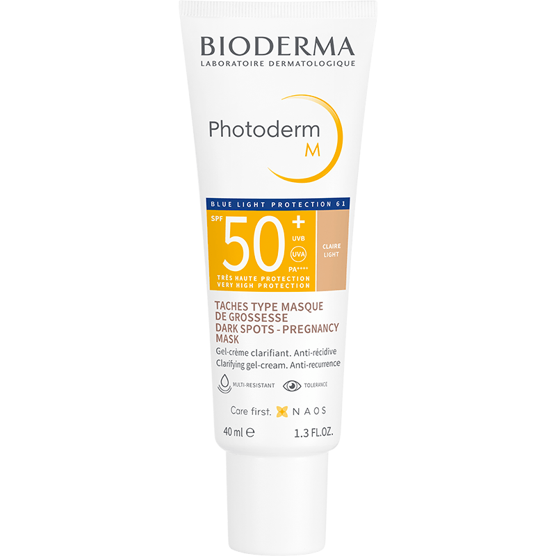Tubo de Bioderma Photoderm M SPF50+ Teint Claire, gel-crema despigmentante con color para manchas del embarazo